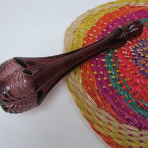 Ancien flacon AVON en verre bordeaux