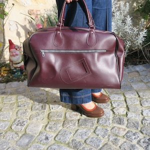 Sac de voyage week-end vintage en vinyle bordeaux
