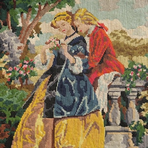 May include: A tapestry depicting a romantic scene with two figures in period clothing. The woman wears a blue dress and the man a red coat. The background features a garden with flowers and trees.