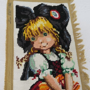 Alsatian tapestry canvas and her cat, vertical format