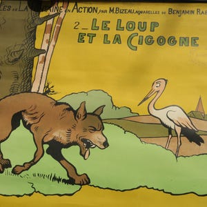 May include: A vintage illustrated poster depicting a wolf and a stork. The poster is yellow with green, brown, and white accents. The text on the poster reads "2_LE LOUP ET LA CIGOGNE".
