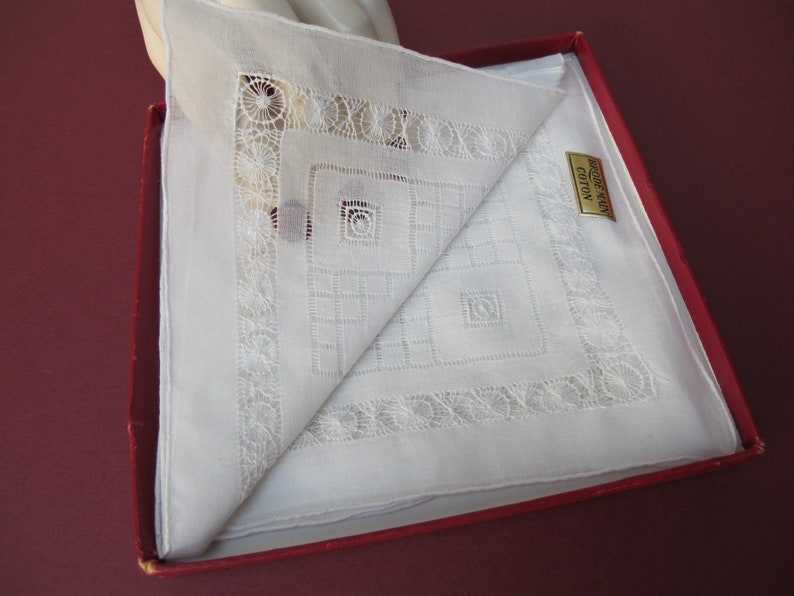 Two old handkerchiefs embroidered white cotton hands in their original box