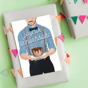 Carte joyeux anniversaire Jeune homme qui souffle ses bougies sur le gâteau - Happy birthday card with candle and cake for man.