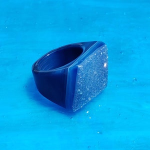 Blue, size 6 Druzy stones are genuine gemstones that have created a layer of crystallization on the surface due to a natural occurrence.
