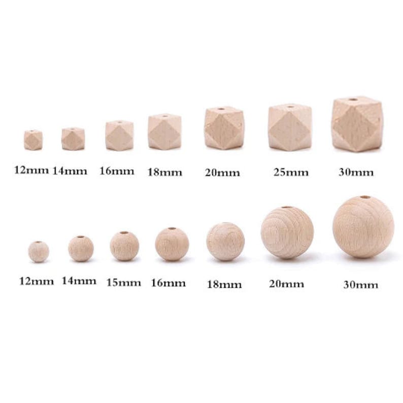 May include: Assortment of wooden beads in various sizes, ranging from 12mm to 30mm. The beads are round and have a natural wood finish.