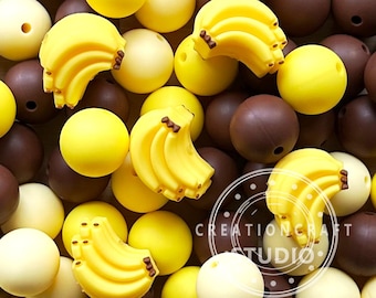 Paquete de 35 cuentas variadas de manzana, plátano, uva, guisante y aguacate, redondas de 15 mm y silicona.