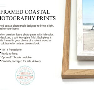May include: Framed coastal photography prints. The image shows a framed photograph of a beach scene with a red lifeguard stand. The frame is natural wood and white oak. The text says "11x14 framed print".