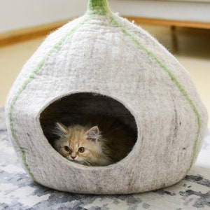 gray-felt-cat-cave-with-flower, pet products, cave, meowfia cat cave, the peekaboo cat cave, best cat cave, cat cave donut, large cat bed cave, heated cat cave, felted wool cat cave, cat caves for sale, felt cave, cattasaurus cat cave, felt cave
