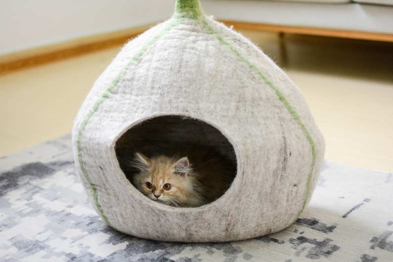 gray-felt-cat-cave-with-flower, pet products, cave, meowfia cat cave, the peekaboo cat cave, best cat cave, cat cave donut, large cat bed cave, heated cat cave, felted wool cat cave, cat caves for sale, felt cave, cattasaurus cat cave, felt cave