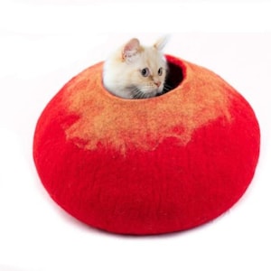 red-round-wool-felt-cat cave, pure newzealand wool, wicker cat cave, boiled wool cat cave, self warming cat cave. woolycave, heated cat cave bed, felt cave cat bed, washable cat cave, best cat cave for large cats, calming cat cave, donut cat hideaway