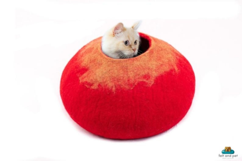 red-round-wool-felt-cat cave, pure newzealand wool, wicker cat cave, boiled wool cat cave, self warming cat cave. woolycave, heated cat cave bed, felt cave cat bed, washable cat cave, best cat cave for large cats, calming cat cave, donut cat hideaway
