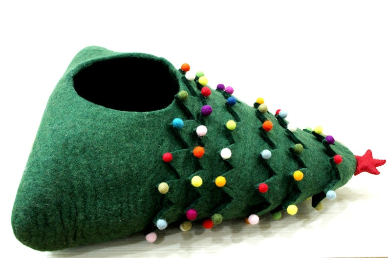 felt cozy hideout for your feline friend, 
pet products, cave, meowfia cat cave, the peekaboo cat cave, best cat cave, cat cave donut, large cat bed cave, heated cat cave, felted wool cat cave, cat caves for sale, felt cave, cattasaurus cat cave