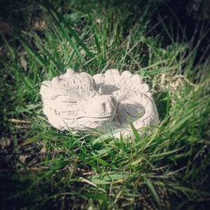 Small stone dragon figure for the garden Weatherproof