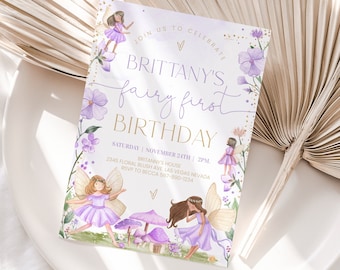 May include: Purple and gold fairy-themed birthday party invitation with a watercolor illustration of fairies, mushrooms, and flowers. The text reads "Join us to celebrate Brittany's fairy first birthday. Saturday, November 24th, 2pm. Brittany's House, 2345 Floral Blush Ave, Las Vegas, Nevada. RSVP to Becca 567-800-1234."