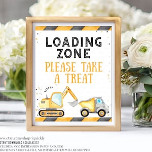 May include: A printable 8x10 inch sign with a yellow and black construction zone theme. The sign says "Loading Zone Please Take A Treat" and features a cartoon excavator and dump truck.