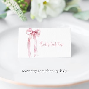 Etiquetas de comida con lazo editables Etiqueta de buffet con lazo rosa Etiqueta de tienda para niña 1.ª Etiqueta de comida Tarjetas de lugar Tarjeta de mesa Plantilla imprimible Descargar Corjl BOW101