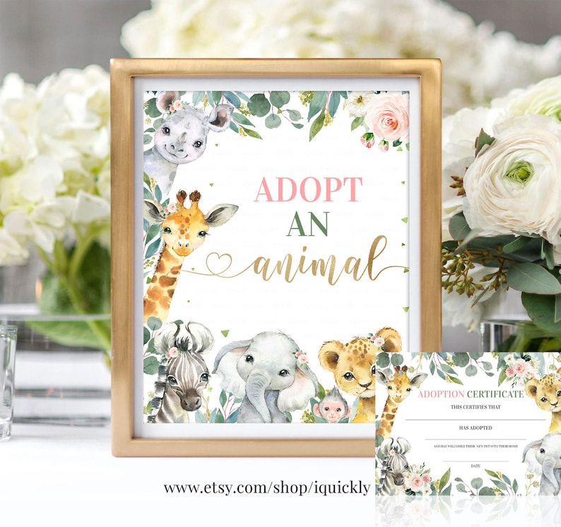 May include: Adopt an Animal sign with a pink and gold design. The sign features a giraffe, zebra, elephant, lion, and monkey surrounded by greenery and flowers. The sign also includes the text "Adopt an Animal" in pink and gold lettering.