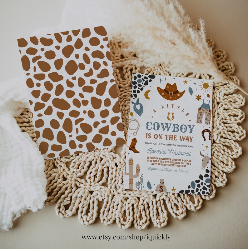 May include: A baby shower invitation with a cowboy theme. The invitation features a brown and white cow print background with a blue, white, and yellow illustration of a cowboy hat, boots, and other western-themed items. The text on the invitation reads "A Little Cowboy is on the Way".