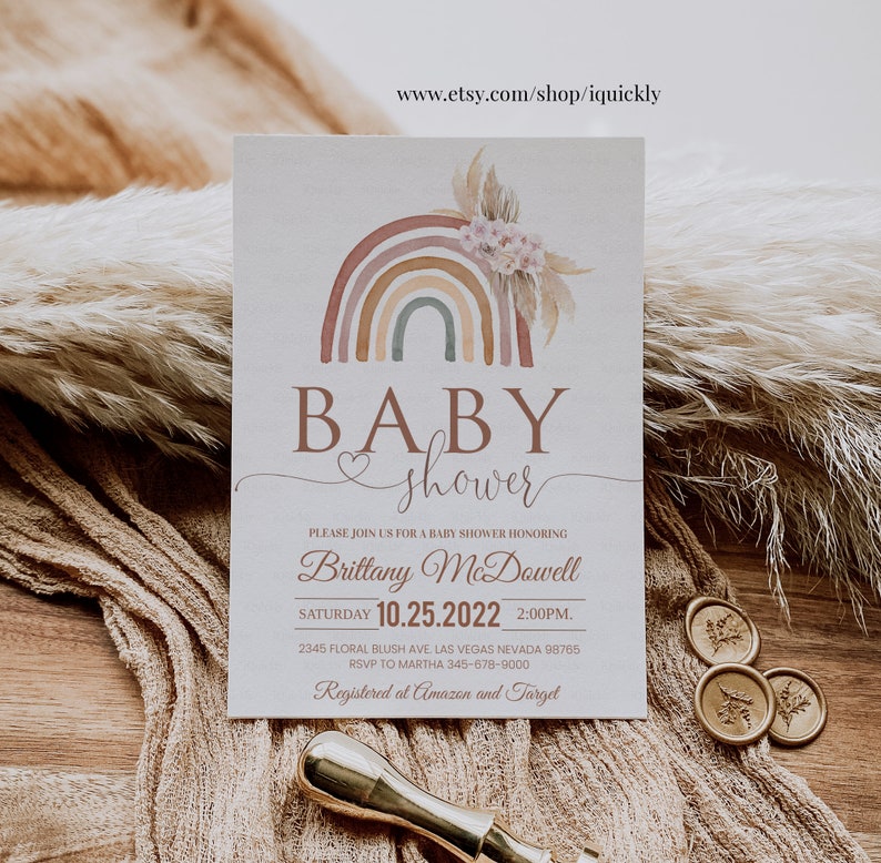 May include: A baby shower invitation with a rainbow and floral design. The invitation says "Baby shower" and includes the date and time of the event, as well as the name of the person being honored, Brittany McDowell. The invitation also includes the address and RSVP information.
