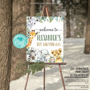 May include: Editable printable sign for a first birthday party with a jungle theme. The sign features a giraffe, zebra, elephant, lion, and monkey with green leaves and gold glitter. The text reads "Welcome to Alexander's 1st Birthday!"