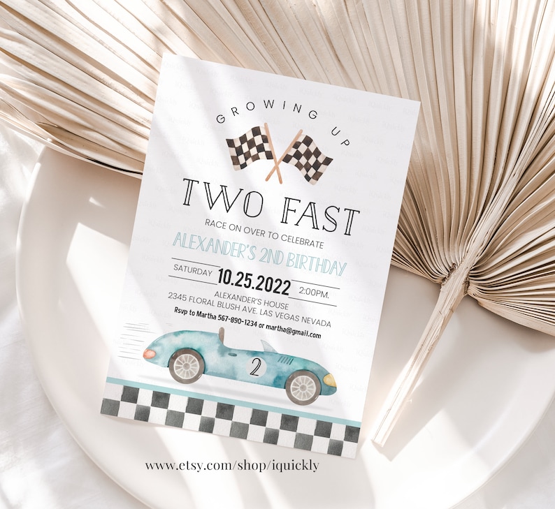 May include: A blue and white race car birthday invitation with a checkered flag design. The invitation says "Growing Up Two Fast" and includes the text "Race on over to celebrate Alexander's 2nd Birthday".