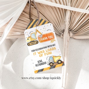 May include: A yellow and black construction themed thank you tag with a watercolor illustration of a yellow excavator and a dump truck. The tag says "Thank You" and "For celebrating with me! It was loads of fun! Love, Alexander" and includes the website www.etsy.com/shop/iquickly.