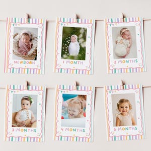 May include: Six rectangular milestone cards hanging on a string, each featuring a pastel striped border with colorful bunting and star accents. The cards display photos of a baby labeled Newborn, 1 Month, 2 Months, 3 Months, 4 Months, and 5 Months.
