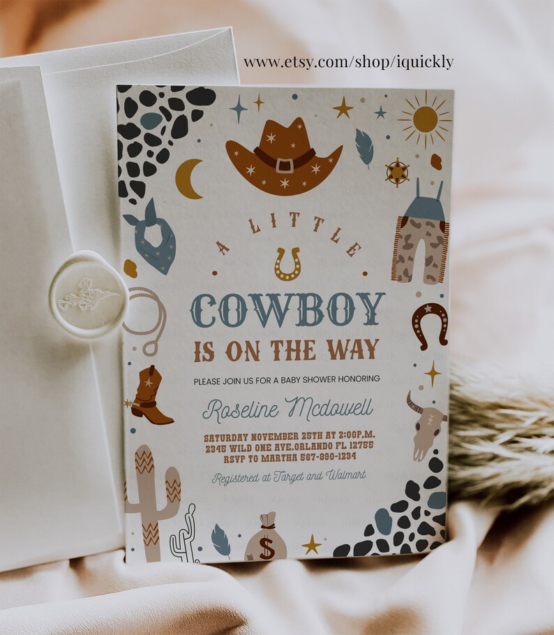 May include: A baby shower invitation with a cowboy theme. The invitation features a brown cowboy hat, a blue bandana, a pair of blue jeans, a horseshoe, and a cactus. The text on the invitation reads "A Little Cowboy is on the Way".