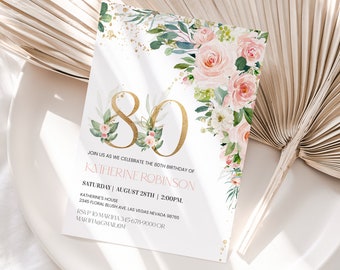 May include: An invitation card with a floral design and gold glitter. The text on the card reads "Join us as we celebrate the 80th birthday of Katherine Robinson. Saturday | August 28th | 2:00PM. Katherine's House 2345 Floral Blush Ave Las Vegas Nevada 98765 RSVP to Mariha 345-678-9000 or Mariha@gmail.com www.etsy.com/shop/iquickly"