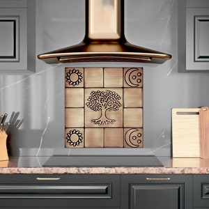 A set of tiles with a tree, moons and suns 100% Copper, Stainless Steel or Brass.