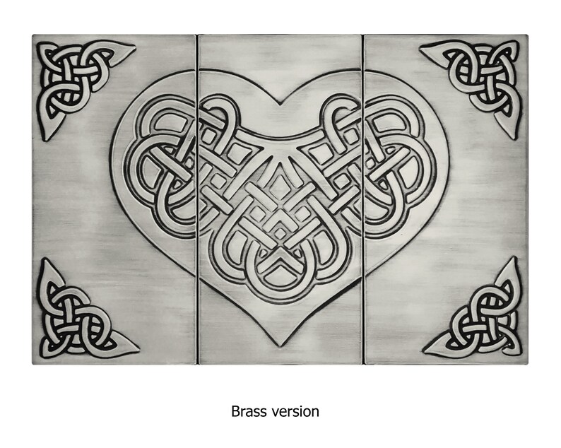 May include: A three-piece wall art set featuring a Celtic knot design in the shape of a heart. The design is in silver and is set against a silver background. The text "Brass version" is printed below the image.