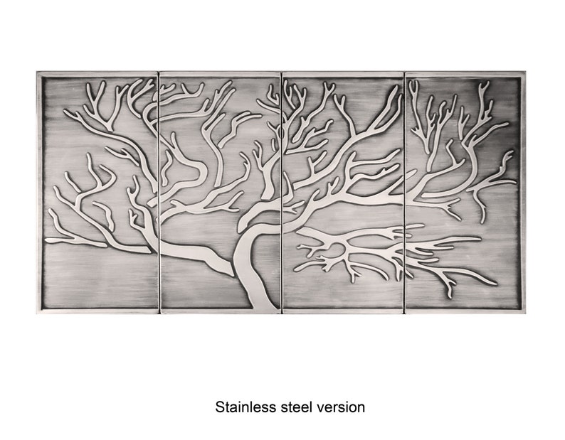 May include: A stainless steel wall art piece featuring a stylized tree with branches and a trunk. The tree is embossed on the metal surface, creating a raised design.