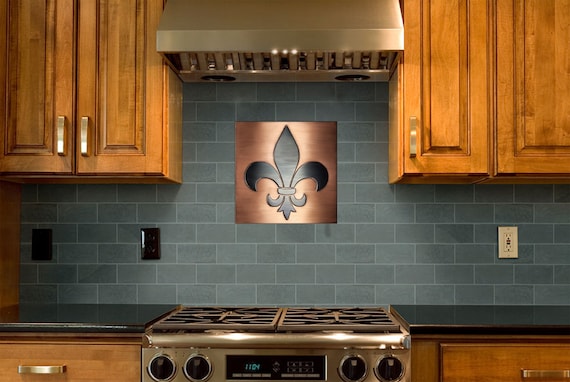Fleur de lis tiles. 100% Copper, Brass or Stainless Steel Covered with patina and wax.