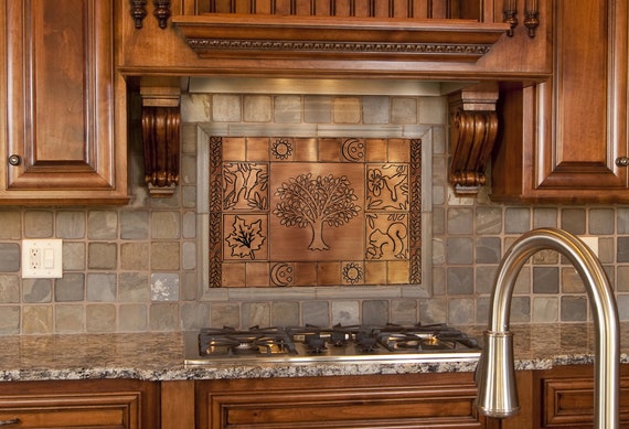 Black tree on stainless steel backsplash - Copper & Craft