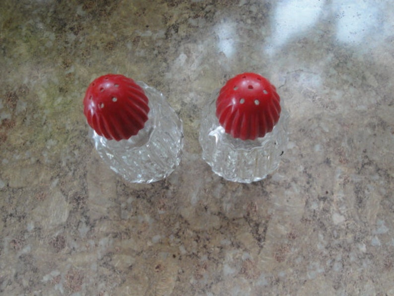 Red Celluloid Top Zipper Pattern Salt And Pepper Shaker Set