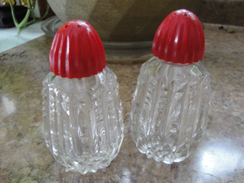 Red Celluloid Top Zipper Pattern Salt And Pepper Shaker Set