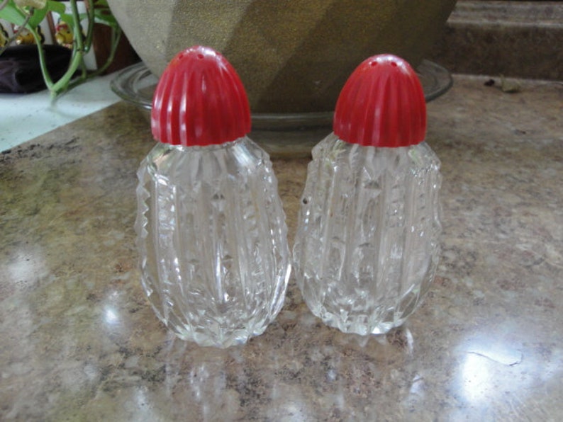 Red Celluloid Top Zipper Pattern Salt And Pepper Shaker Set