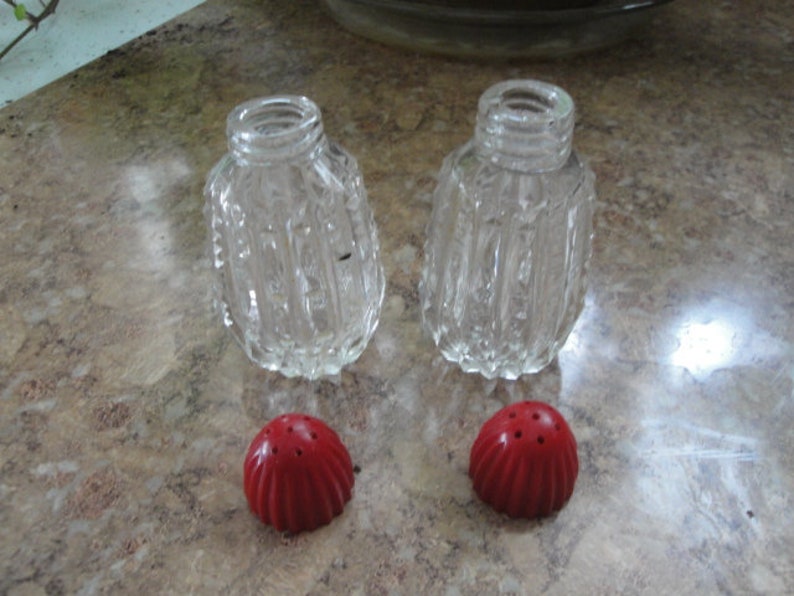 Red Celluloid Top Zipper Pattern Salt And Pepper Shaker Set