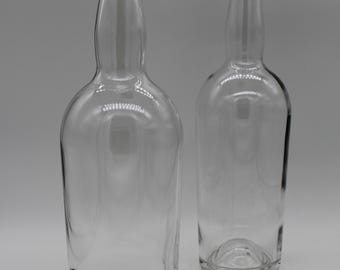 Enchanting ensemble of heavy glass vases made from vintage whiskey bottles