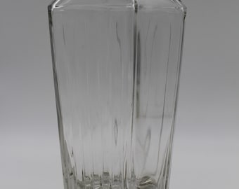 Beautiful heavy glass vase made from a vintage whiskey bottle