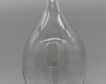 Large boho floor vase made of glass with raffia decoration on the bottom edge, vintage