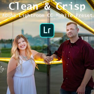 May include: A couple poses in front of a glass building with yellow lights. The text "Clean & Crisp" and "Adobe Lightroom CC Mobile Preset" is displayed above the couple. The text "Lr" is displayed in a blue box in the center of the image.