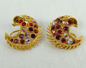 Vintage Rhinestone Earrings 70s Coro Clip Ons Gold Tone Faux Ruby Aurora Borealis Crescent Moon Shape Glam Festive Holiday Jewelry