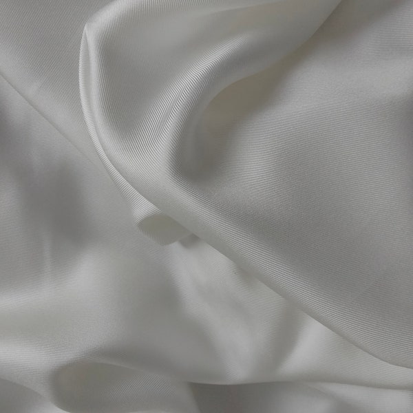 Luxury fabric. Ecru colored silk twill. Fluid and light fabric by the meter. Couture wedding dress, haute couture, dress making