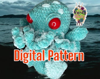 May include: A teal blue crocheted octopus with white accents and red eyes. The octopus is sitting in the water with a stormy sky in the background. The text "Digital Pattern" is written in orange letters below the octopus.