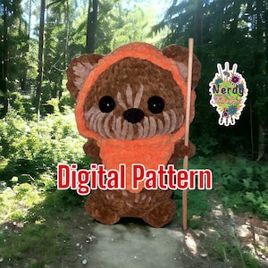 May include: A brown and orange crocheted plush toy of a character from Star Wars, standing on a path in a forest. The toy is holding a wooden stick. The text "Digital Pattern" is written in red letters below the toy.