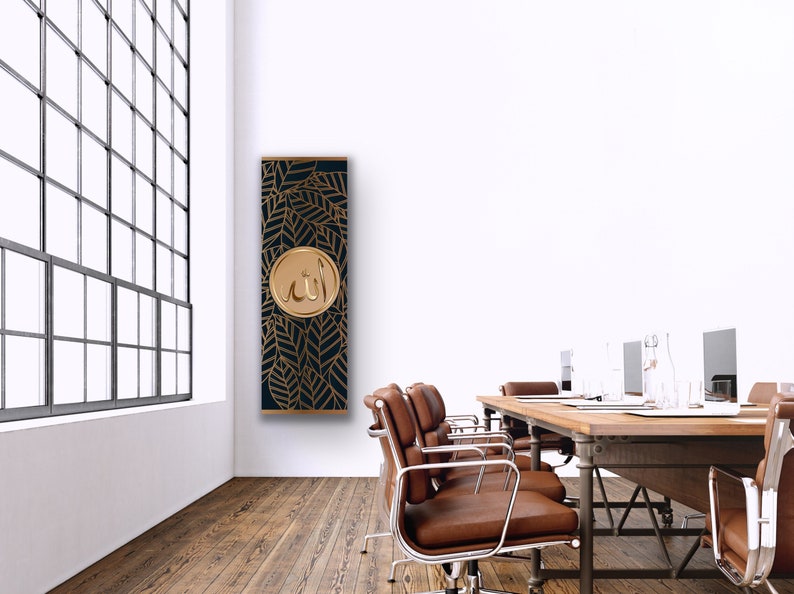 May include: A black and gold wall art print with a decorative pattern of leaves and the word "Allah" in a gold circle.