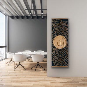 May include: A black and gold wall art piece with a circular design featuring the Arabic word "Allah" in gold lettering. The background is a dark blue with a pattern of gold leaves.