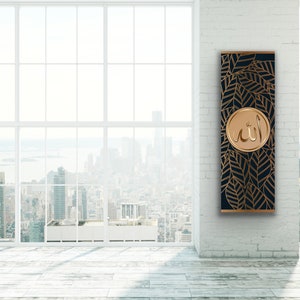 May include: A black and gold canvas print with a decorative pattern of leaves and the word "Allah" in a gold circle.