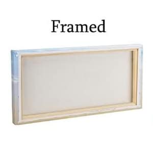 May include: A framed canvas with a light wood frame. The canvas is white and the frame is a light brown color.
